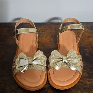 Girls gold with bow sandals